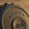 Close-up of a black Vibit roller with texture and branding.